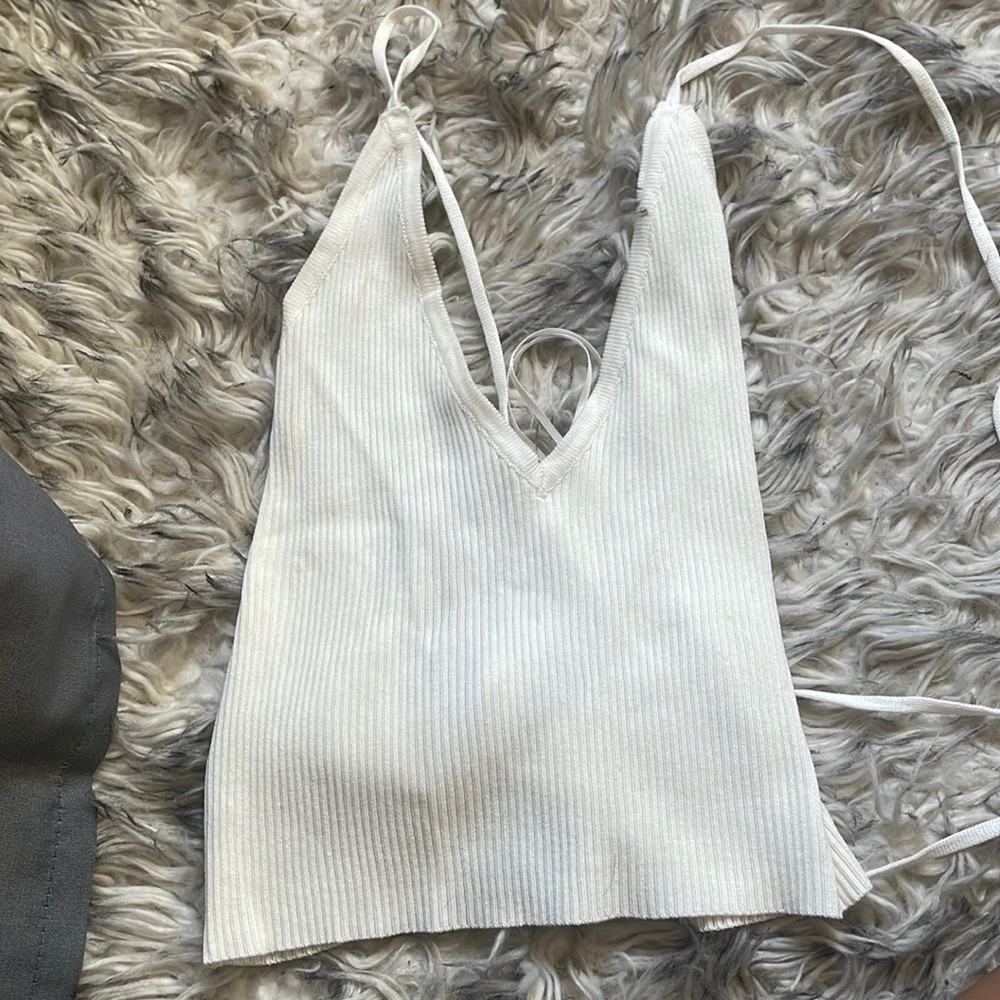 White stringy top
